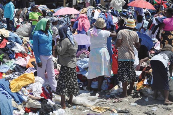 Second-hand clothes sold in a market. Photograph: http://www.compassion.com/haiti/port-au-prince.htm